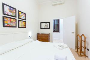 A bed or beds in a room at Keys of Italy / Valpetrosa 10 - Touch of Elegance