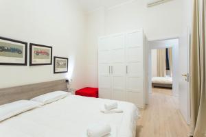 A bed or beds in a room at Keys of Italy / Valpetrosa 10 - Touch of Elegance