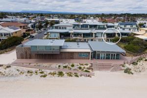 an aerial view of a house on the beach at Groves Sunset Views in Aspendale in Aspendale