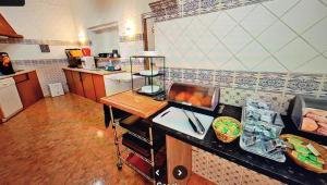 A cozinha ou cozinha compacta de Guesthouse of Alcobaça