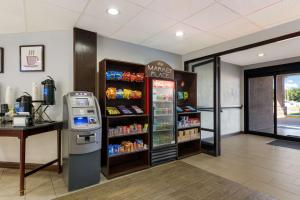 a convenience store with a drink cooler and a drink machine at Best Western Albemarle Inn in Albemarle