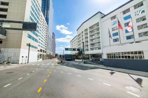 an empty street in a city with tall buildings at Hotel Tampa Riverwalk in Tampa