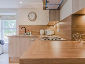 A cozinha ou cozinha compacta de Dalnaglar Cottage - Uk30260