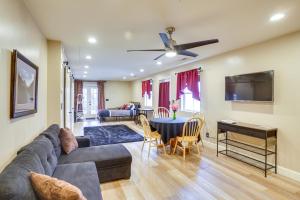 a living room with a couch and a table at Convenient Cedar City Studio Less Than Half-Mi to Downtown in Cedar City