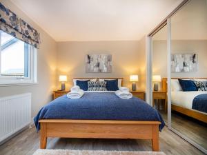 Uma cama ou camas num quarto em Sunnyside Culloden
