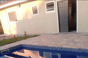 Πισίνα στο ή κοντά στο Quarto Privado em Santana de Parnaíba