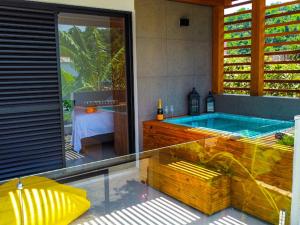 Swimmingpoolen hos eller tæt på Home Aguas da barra Ilhabela