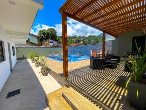 สระว่ายน้ำที่อยู่ใกล้ ๆ หรือใน Home Aguas da barra Ilhabela