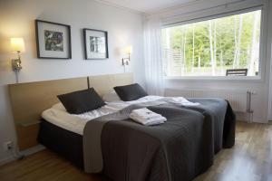 Letto o letti in una camera di Toftastrand Hotell