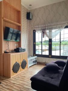 TV a/nebo společenská místnost v ubytování Diana Puncak resort