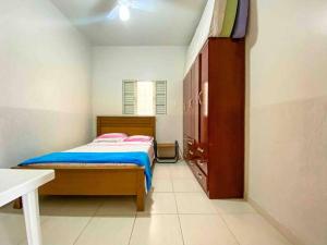 سرير أو أسرّة في غرفة في Casa entre Cabo Frio e Arraial do Cabo