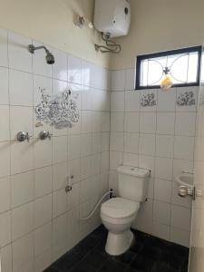 Koupelna v ubytování Diana Puncak resort + 12 fotografií