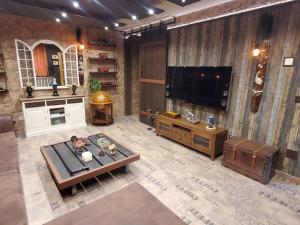 a large living room with a flat screen tv at Chalet entero en La Rioja in Briones