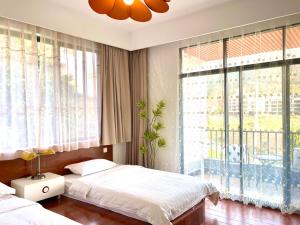 Katil atau katil-katil dalam bilik di 林涧小栈Linger house