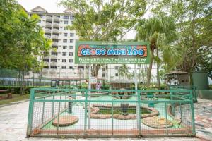 a cage at a park with snakes in it at Ruiyas Sea View Condominium PortDickson in Port Dickson