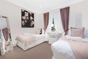 Ένα ή περισσότερα κρεβάτια σε δωμάτιο στο Paddington Cottage, Kangaroo Valley