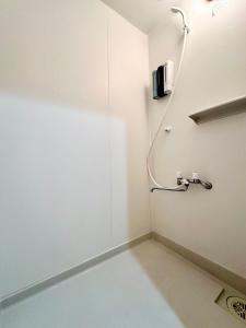 ห้องน้ำของ 鶴橋駅徒歩2分 トイレ浴室複数あり3階建て一軒家車庫付き