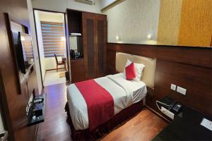 Voodi või voodid majutusasutuse Hotel High Point toas