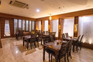 Restoran või mõni muu söögikoht majutusasutuses Hotel High Point