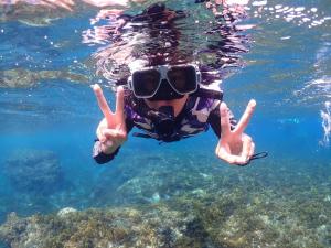 Asiakkaita majoituspaikassa 小琉球遇見海旅宿