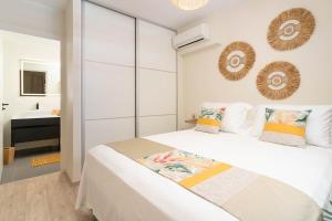Кровать или кровати в номере Tetavake Luxury Suite