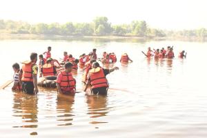 a group of people are in the water at Z-Bac Adventure & Leisure Resort Kolad in Kolād