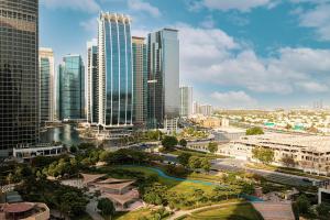 a view of a city with tall buildings at HomesGetaway - Stylish 1BR Armada Cluster P in Dubai
