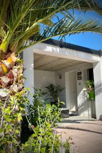 a front entrance to a house with a garage at Studio indépendant Pa Ni Pwoblem in Vitrolles