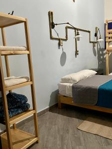 Ένα ή περισσότερα κρεβάτια σε δωμάτιο στο Céntrica habitación privada , #7 de 1 a 4 personas, Casona Doña Paula Aparta-hotel, baño compartido