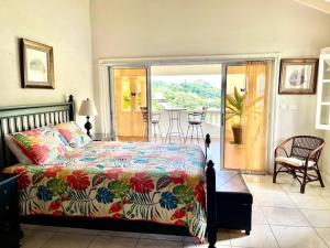 Кровать или кровати в номере Villa Ashiana - Beautiful 3-bedroom villa in Marigot Bay villa