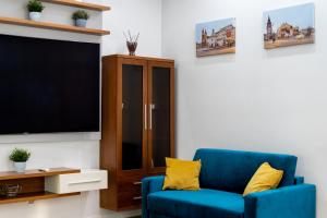 TV a/nebo společenská místnost v ubytování BlueApart with Terrace