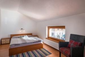 Ein Bett oder Betten in einem Zimmer der Unterkunft Pension Lunatyk