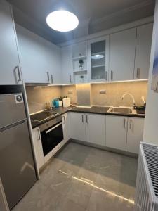 Kuchyň nebo kuchyňský kout v ubytování Serres city center modern apartment (Monika)