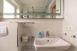 Ένα μπάνιο στο Ferienwohnung Heimathafen