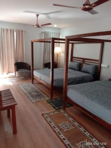 Letto o letti in una camera di COCO CABANA