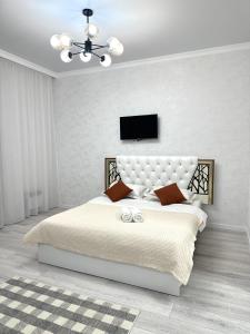 Een bed of bedden in een kamer bij Закрыто