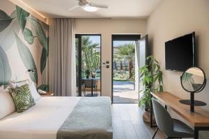 Posteľ alebo postele v izbe v ubytovaní Mossa Well Being Hotel