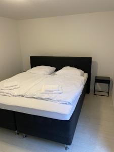 Postel nebo postele na pokoji v ubytování Ferienwohnung Amstelbach - Nähe CHIO Aachen