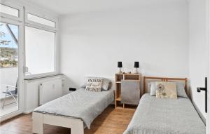 Lova arba lovos apgyvendinimo įstaigoje Nice Apartment In Tauberbischofsheim With Wifi