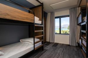 Postel nebo postele na pokoji v ubytování Haka House Lake Tekapo