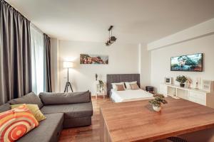 Bright and Cozy Studios and Flats - Palas Mall tesisinde bir oturma alanı