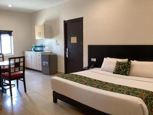 Posteľ alebo postele v izbe v ubytovaní Adis Hotels Prime