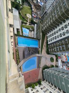 Bazén v ubytování Avida Towers Riala Tower1-1517 nebo v jeho okolí