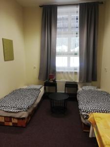 Ein Bett oder Betten in einem Zimmer der Unterkunft Apartmány Elisabeth