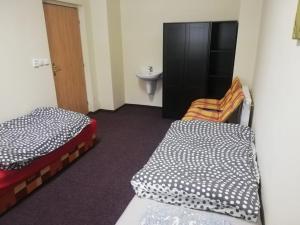 Ein Bett oder Betten in einem Zimmer der Unterkunft Apartmány Elisabeth