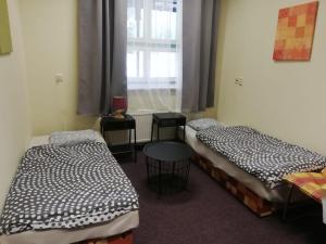 Ein Bett oder Betten in einem Zimmer der Unterkunft Apartmány Elisabeth