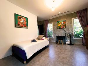 Postel nebo postele na pokoji v ubytování VILLA FLORA 5/6P
