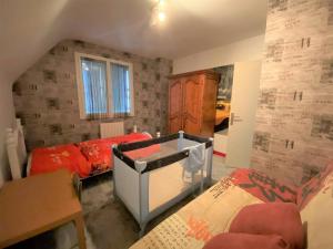 Posteľ alebo postele v izbe v ubytovaní Maison avec jardin et WIFI à PERROS-GUIREC - Réf 336
