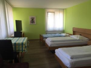 Postel nebo postele na pokoji v ubytování Hotel Mare & Monti