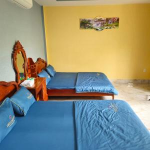 Postel nebo postele na pokoji v ubytování Homestay Bảo Bình